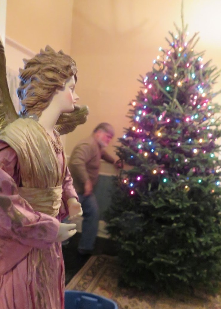angel overlooks the decorating